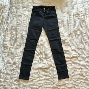 Black skinny jeans. Size 6, Divided.